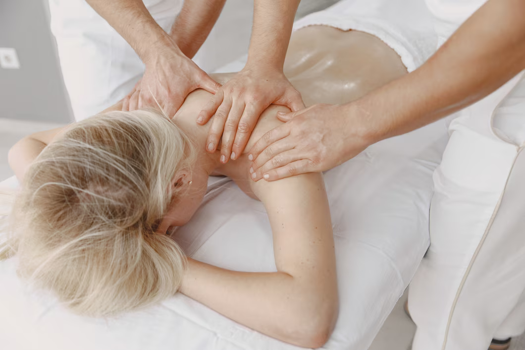 person 3 getting massaged